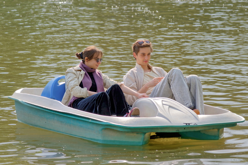 Young couple on a pedal boat